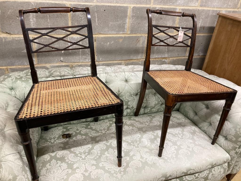 A pair of Regency beech cane seat chairs